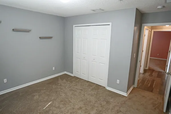 an empty room with closet