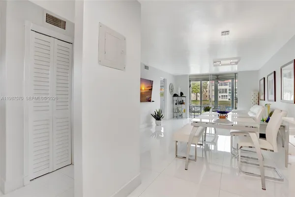 a view of a livingroom with furniture and window