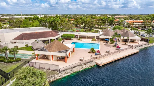 an aerial view of a house with a garden