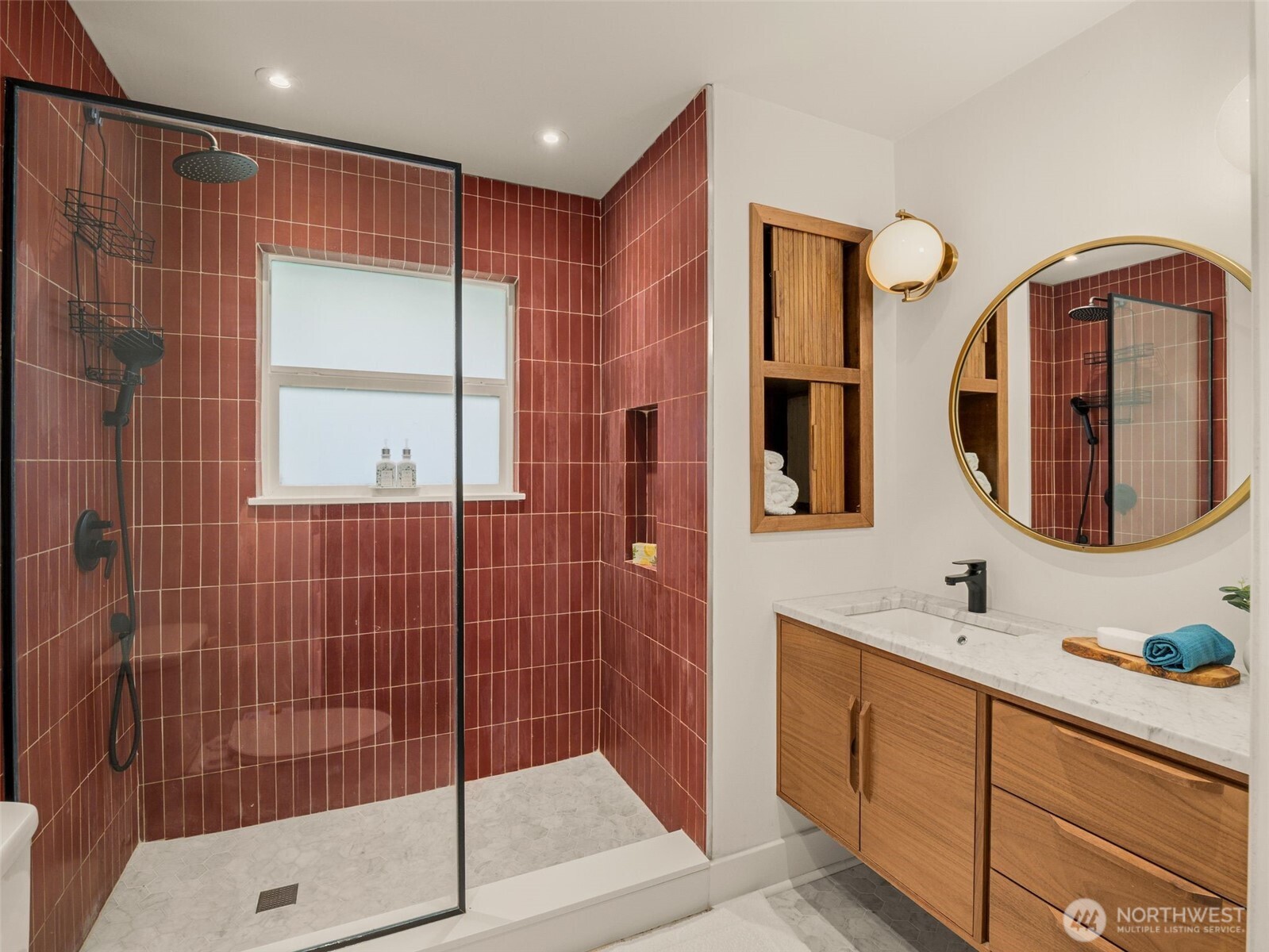 3928 South Pilgrim Street Seattle, WA 98118 - Photo 15 of 27 a bathroom with a double vanity sink mirror and shower