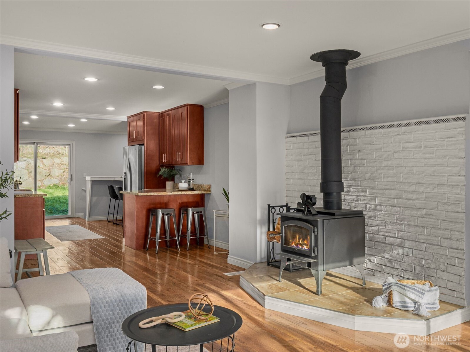 3928 South Pilgrim Street Seattle, WA 98118 - Photo 7 of 27 a living room with furniture and a fireplace