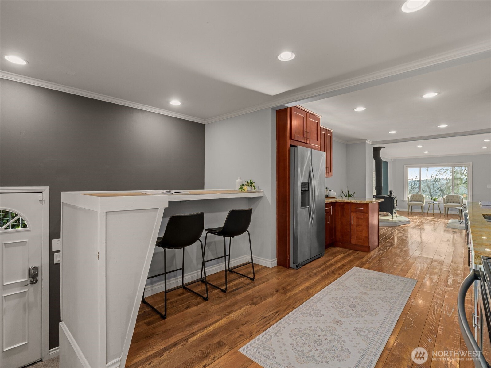 3928 South Pilgrim Street Seattle, WA 98118 - Photo 9 of 27 a lobby with furniture and wooden floor