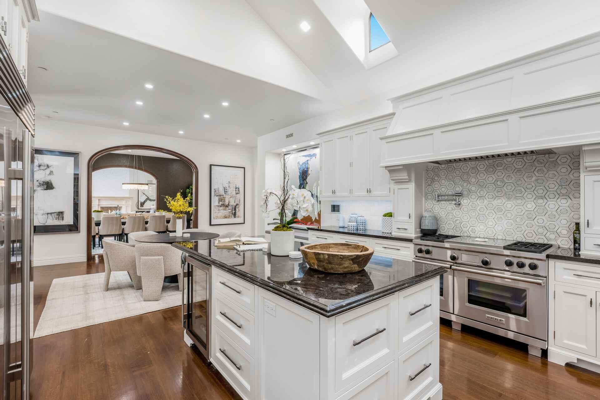 2084 East Valley Road, Unit SHARE 1 Santa Barbara, CA 93108 - Photo 11 of 35 a kitchen with stainless steel appliances kitchen island a stove and white cabinets