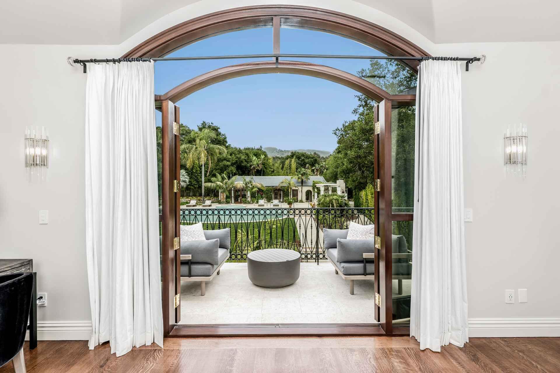 2084 East Valley Road, Unit SHARE 1 Santa Barbara, CA 93108 - Photo 14 of 35 a view of a balcony with chair and a potted plant