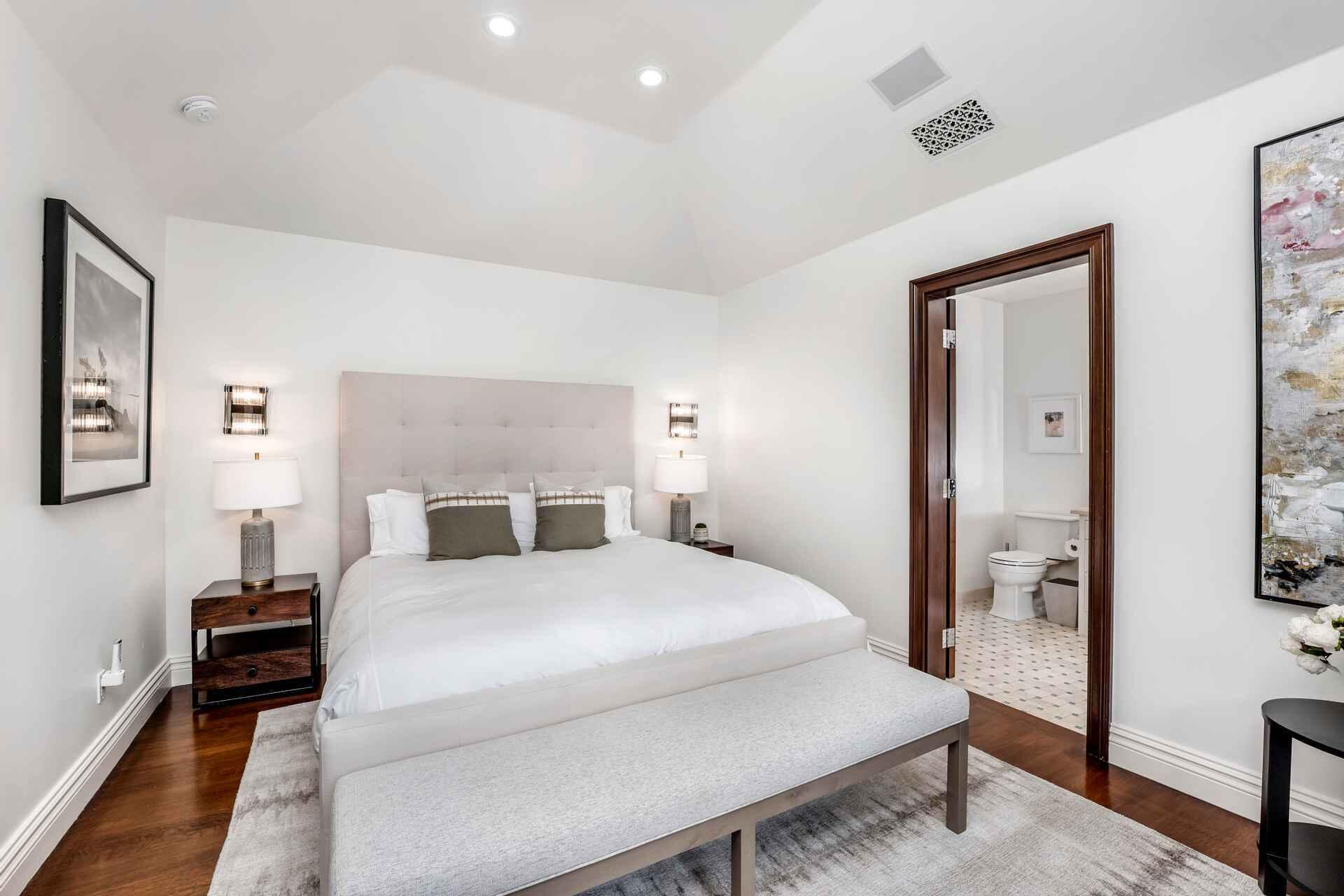 2084 East Valley Road, Unit SHARE 1 Santa Barbara, CA 93108 - Photo 32 of 35 a bedroom with a bed and a night stand