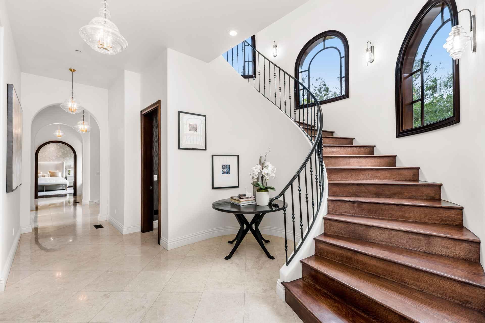 2084 East Valley Road, Unit SHARE 1 Santa Barbara, CA 93108 - Photo 8 of 35 a view of staircase with lots of frames and frames on wall