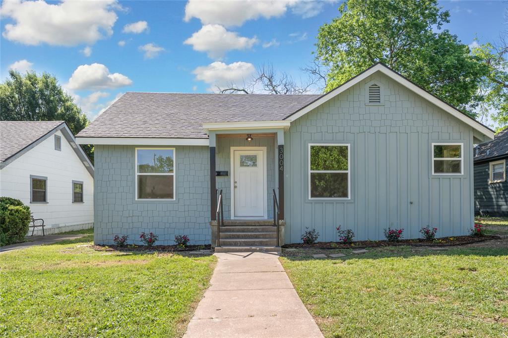 a front view of house with yard