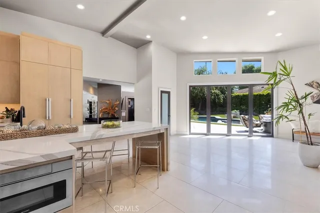 a kitchen with sink and stove