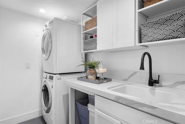 a bedroom with a bed and furniture