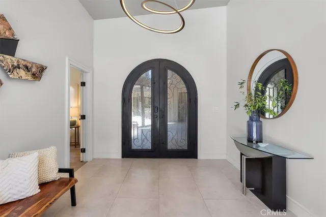a view of an entryway with wooden floor