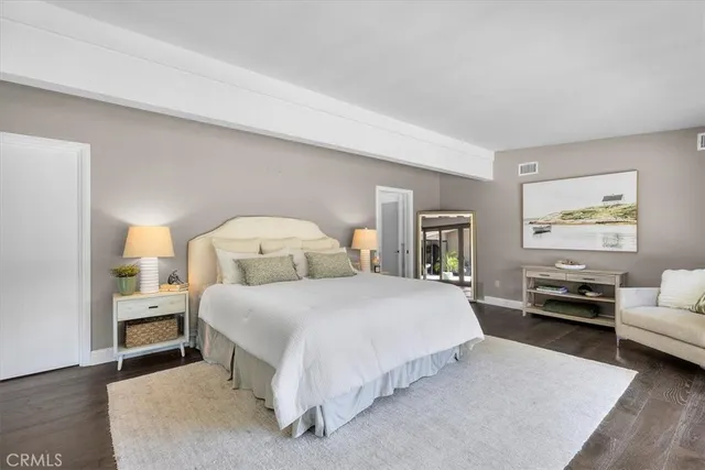 a view of a house with swimming pool and sitting area