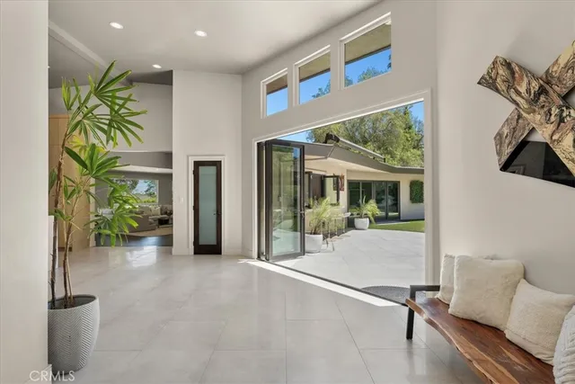 a kitchen with granite countertop a sink and a window