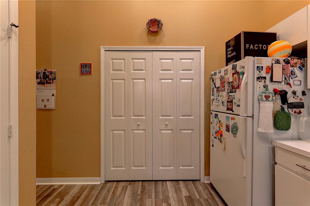 8405 Terrace Meadows Court, Unit 8405 Temple Terrace, FL 33637 - Photo 14 of 28 a view of walk in closet with clothes and shoes