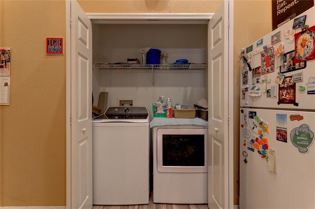 8405 Terrace Meadows Court, Unit 8405 Temple Terrace, FL 33637 - Photo 15 of 28 a utility room with dryer and washer