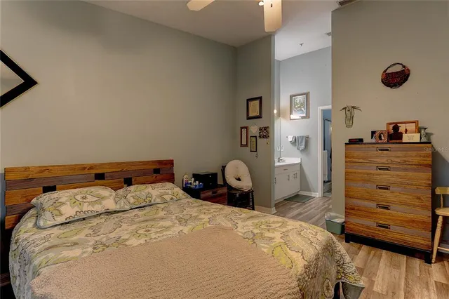 a bedroom with a bed and a closet