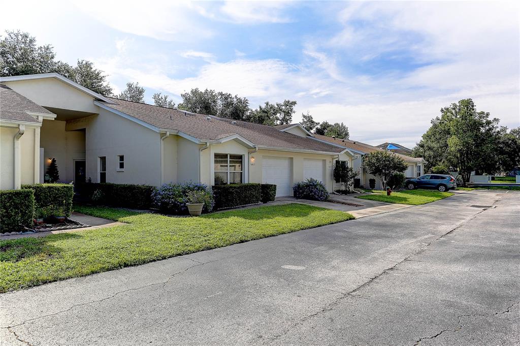 8405 Terrace Meadows Court, Unit 8405 Temple Terrace, FL 33637 - Photo 2 of 28 a view of a house with a patio
