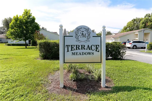 a sign on the side of the road