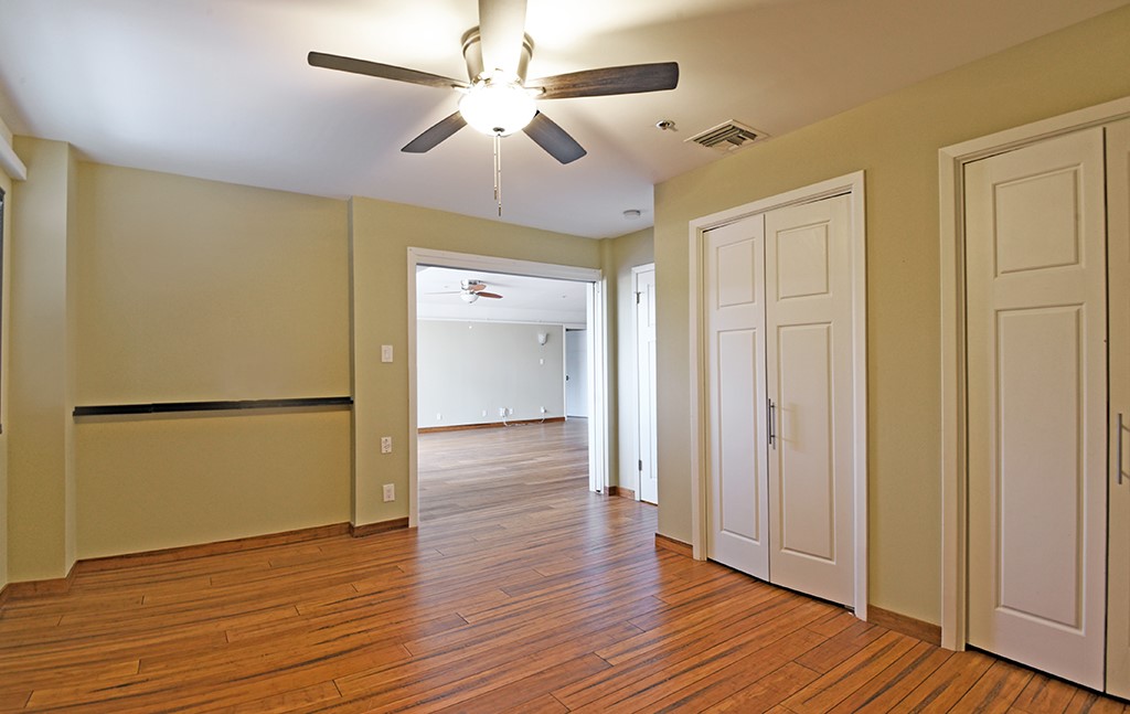 40 North Interstate Highway 35, Unit 2C2 Austin, TX 78701 - Photo 19 of 35 a view of an empty room with wooden floor