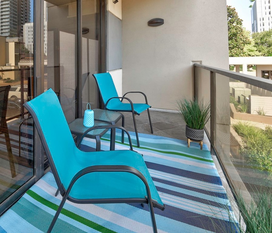 40 North Interstate Highway 35, Unit 2C2 Austin, TX 78701 - Photo 22 of 35 a view of balcony with wooden floor outdoor seating and plants