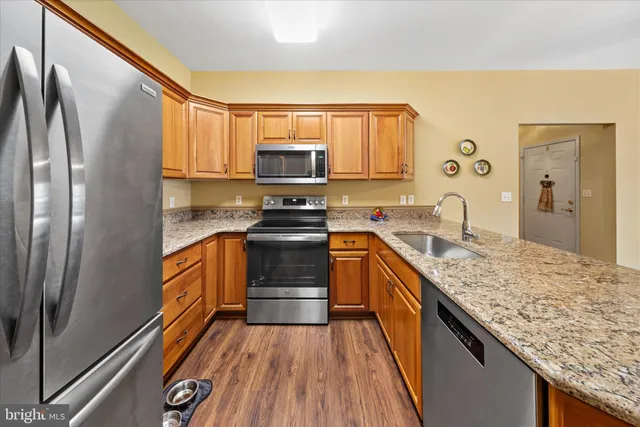 a bedroom with two beds and a window