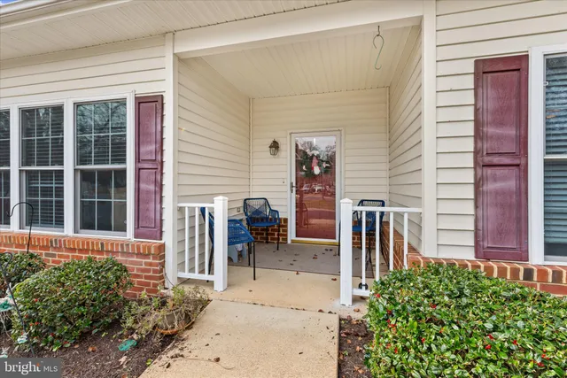 a kitchen with stainless steel appliances granite countertop a refrigerator a stove top oven a sink and dishwasher