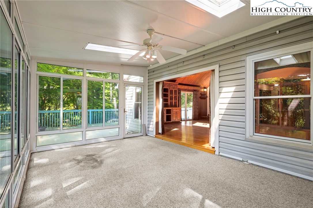 171 Jenny Lane Boone, NC 28607 - Photo 11 of 50 a very nice looking room with large windows and plants