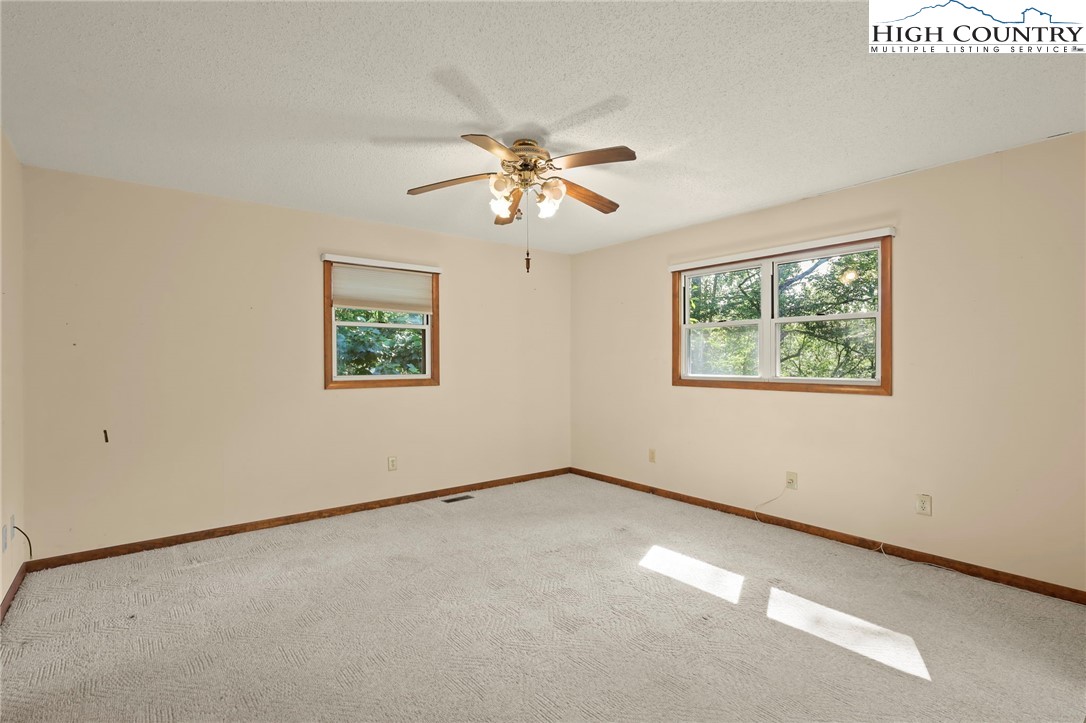 171 Jenny Lane Boone, NC 28607 - Photo 20 of 50 a view of an empty room with a window