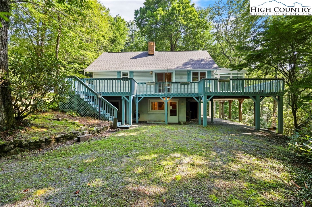 171 Jenny Lane Boone, NC 28607 - Photo 3 of 50 a front view of a house with garden