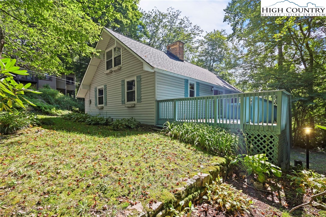 171 Jenny Lane Boone, NC 28607 - Photo 4 of 50 a backyard of a house with lots of green space