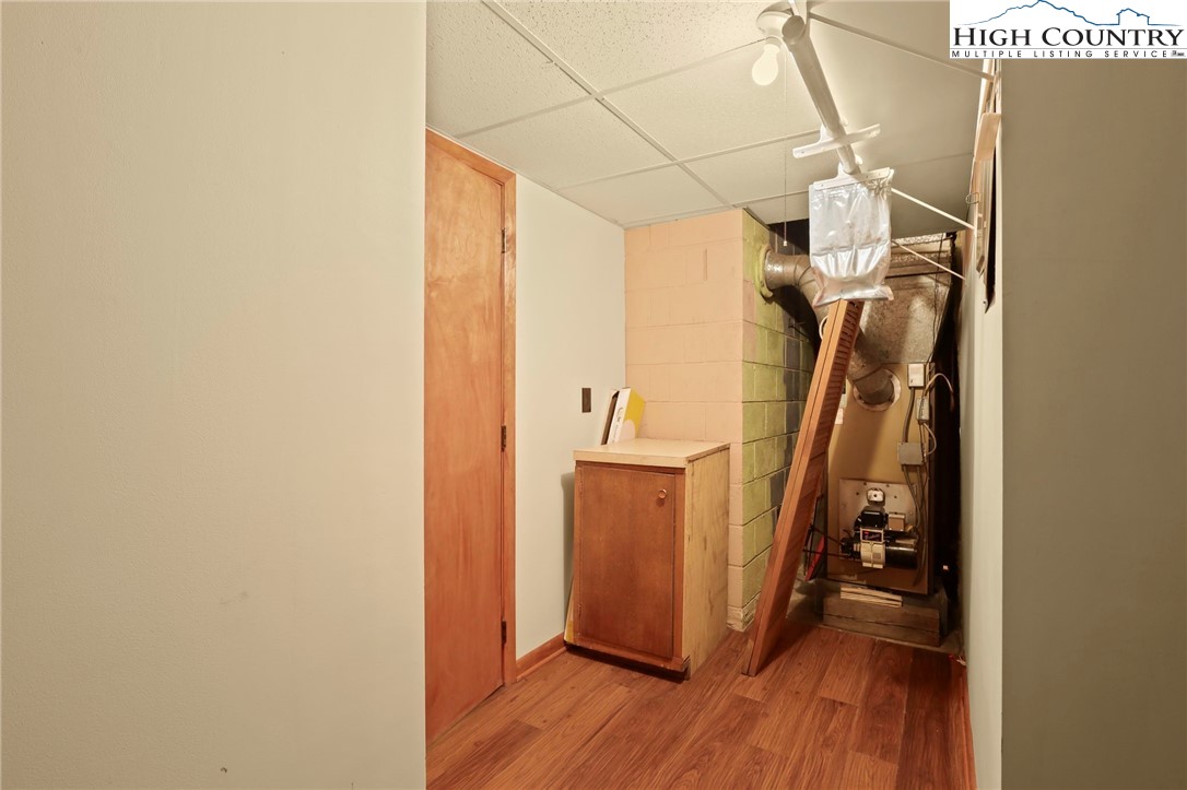 171 Jenny Lane Boone, NC 28607 - Photo 45 of 50 a view of a storage & utility room with wooden floor