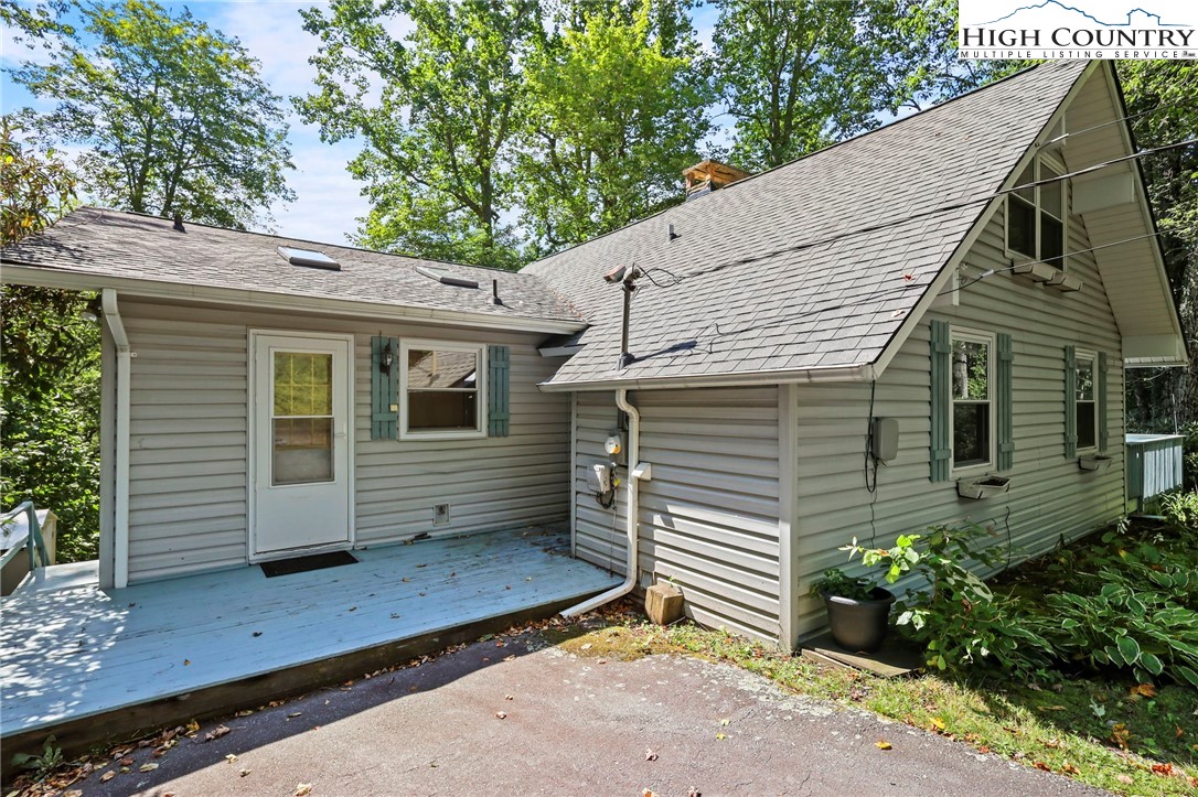171 Jenny Lane Boone, NC 28607 - Photo 5 of 50 a view of a house with a yard