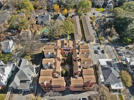 an aerial view of waterside residential houses with outdoor space