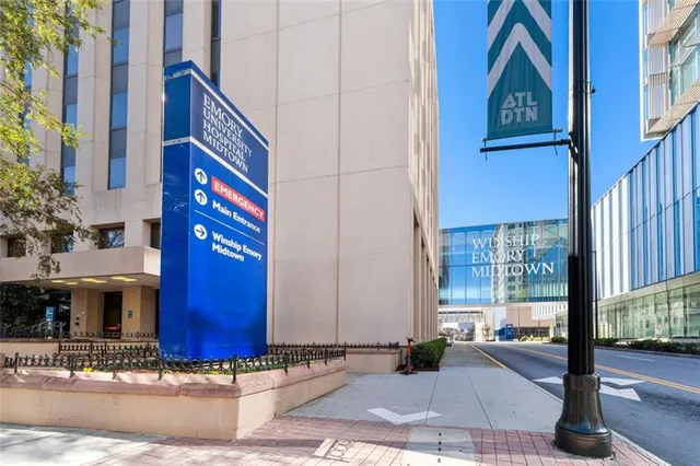 a view of a street with building in the background