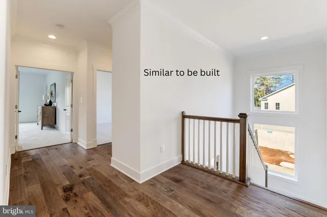 a view of livingroom with furniture and wooden floor