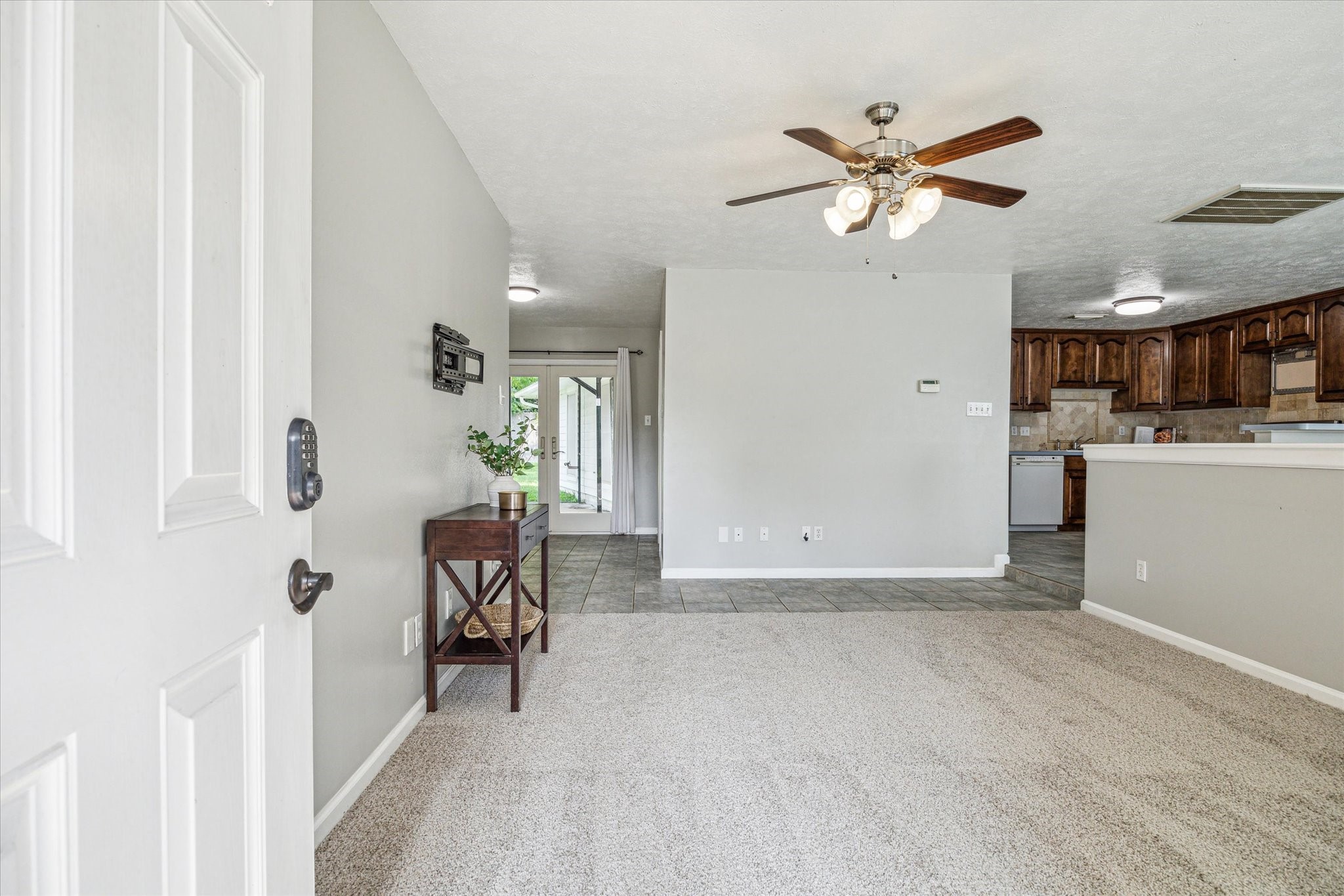 3613 Lazy Spring Drive Houston, TX 77080 - Photo 22 of 22 a view of a livingroom with a chair and potted plant