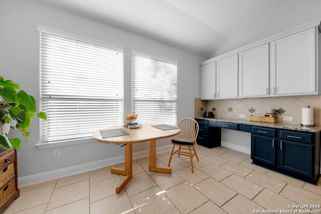 400 Bison Lane Cibolo, TX 78108 - Photo 13 of 34 a kitchen with a sink cabinets and window