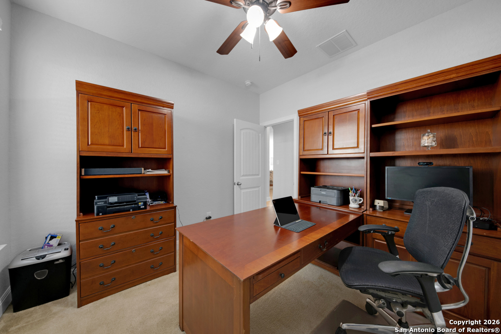 400 Bison Lane Cibolo, TX 78108 - Photo 24 of 34 a view of a workspace with furniture