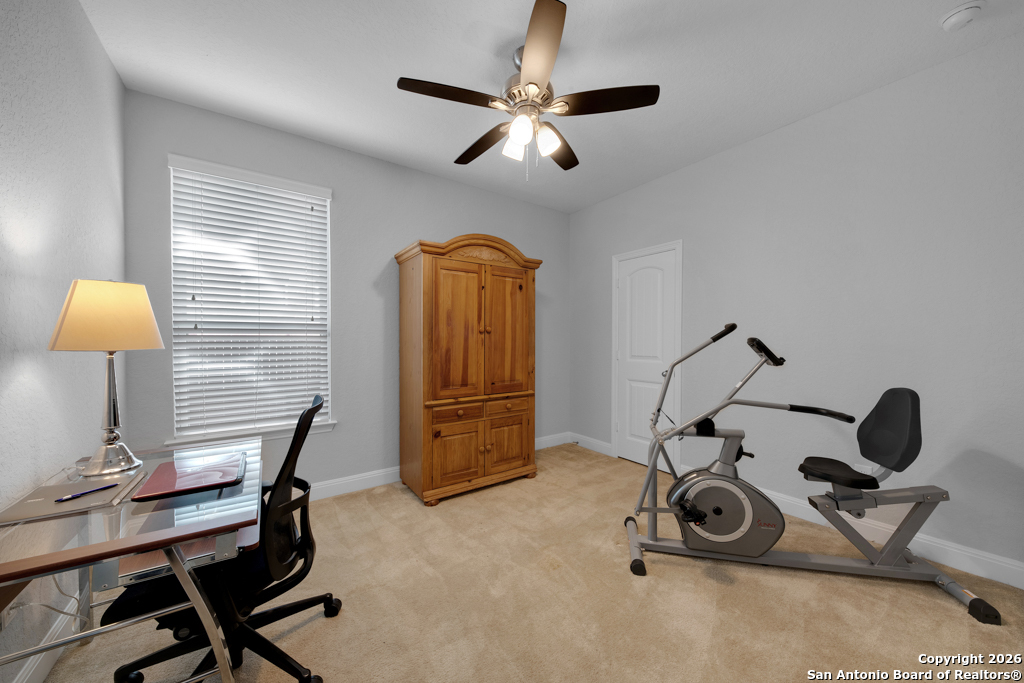 400 Bison Lane Cibolo, TX 78108 - Photo 25 of 34 a view of a room with gym equipment