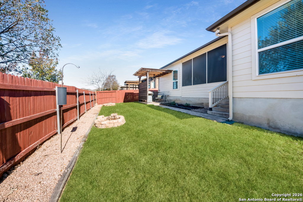 400 Bison Lane Cibolo, TX 78108 - Photo 34 of 34 a view of a house with a yard and wooden fence