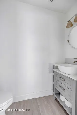 a bathroom with a sink and a toilet