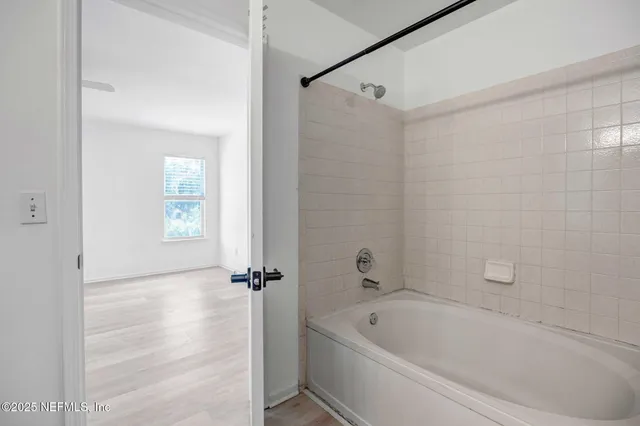 a bathroom with a bathtub