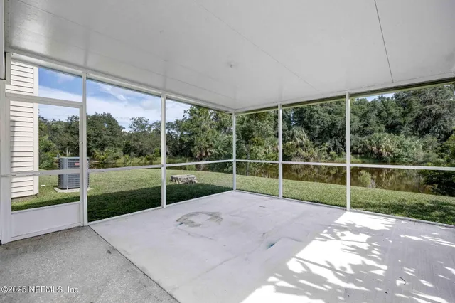 a view of a backyard with porch