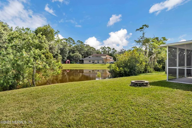 a view of a golf course with a house