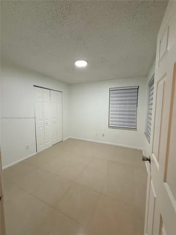 a view of a livingroom with furniture