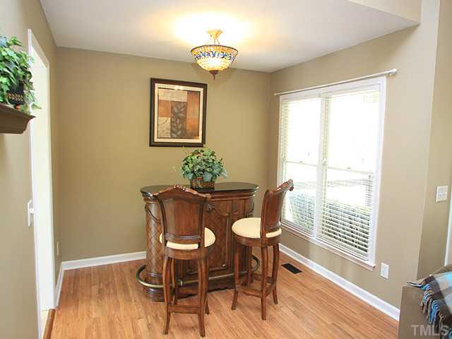 2904 Enson Place Raleigh, NC 27603 - Photo 8 of 25 Dining room currently serves as bar area. Great for entertaining!