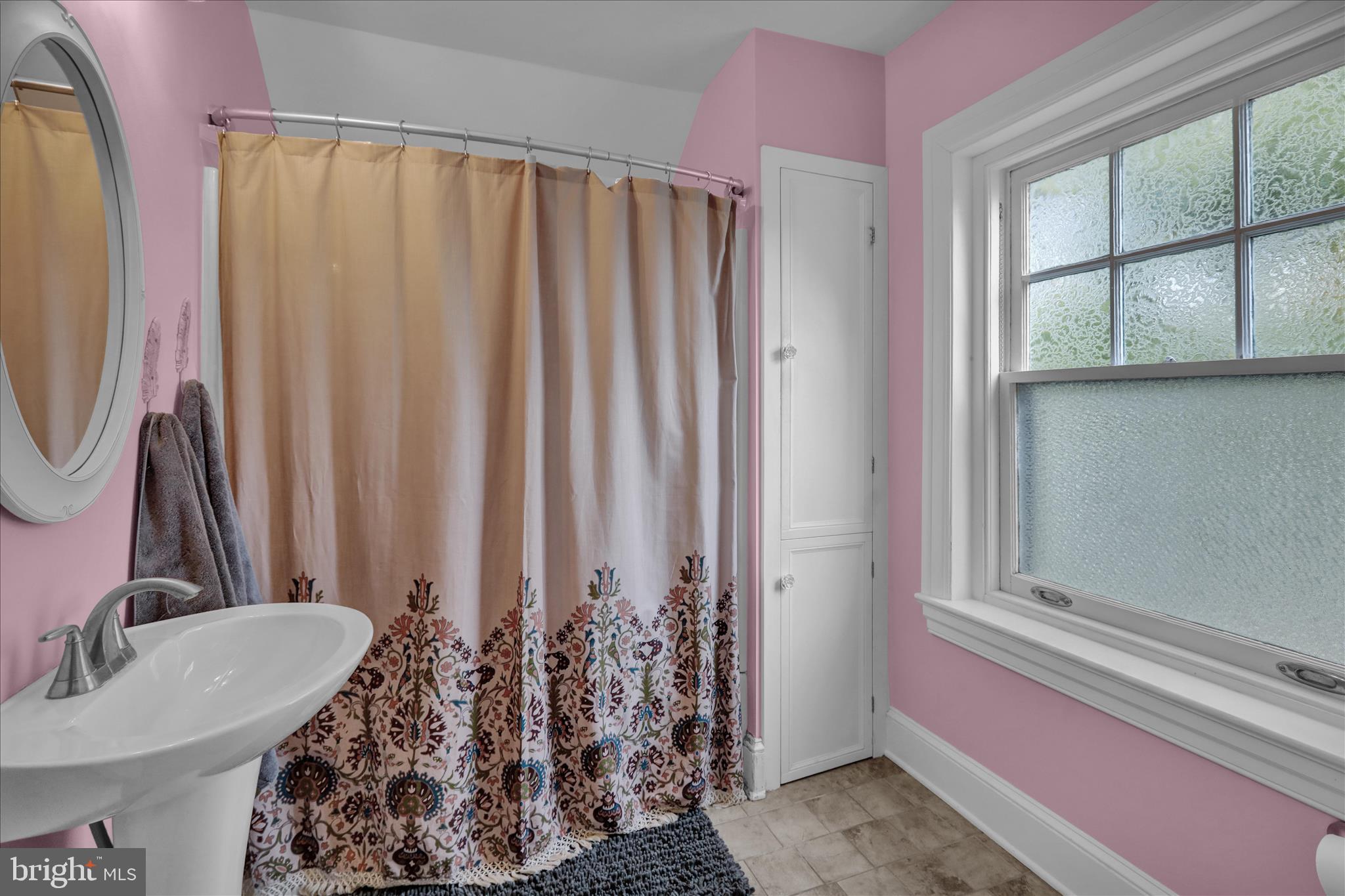 1314 Garfield Avenue Reading, PA 19610 - Photo 12 of 24 a bathroom with a double vanity sink and a mirror
