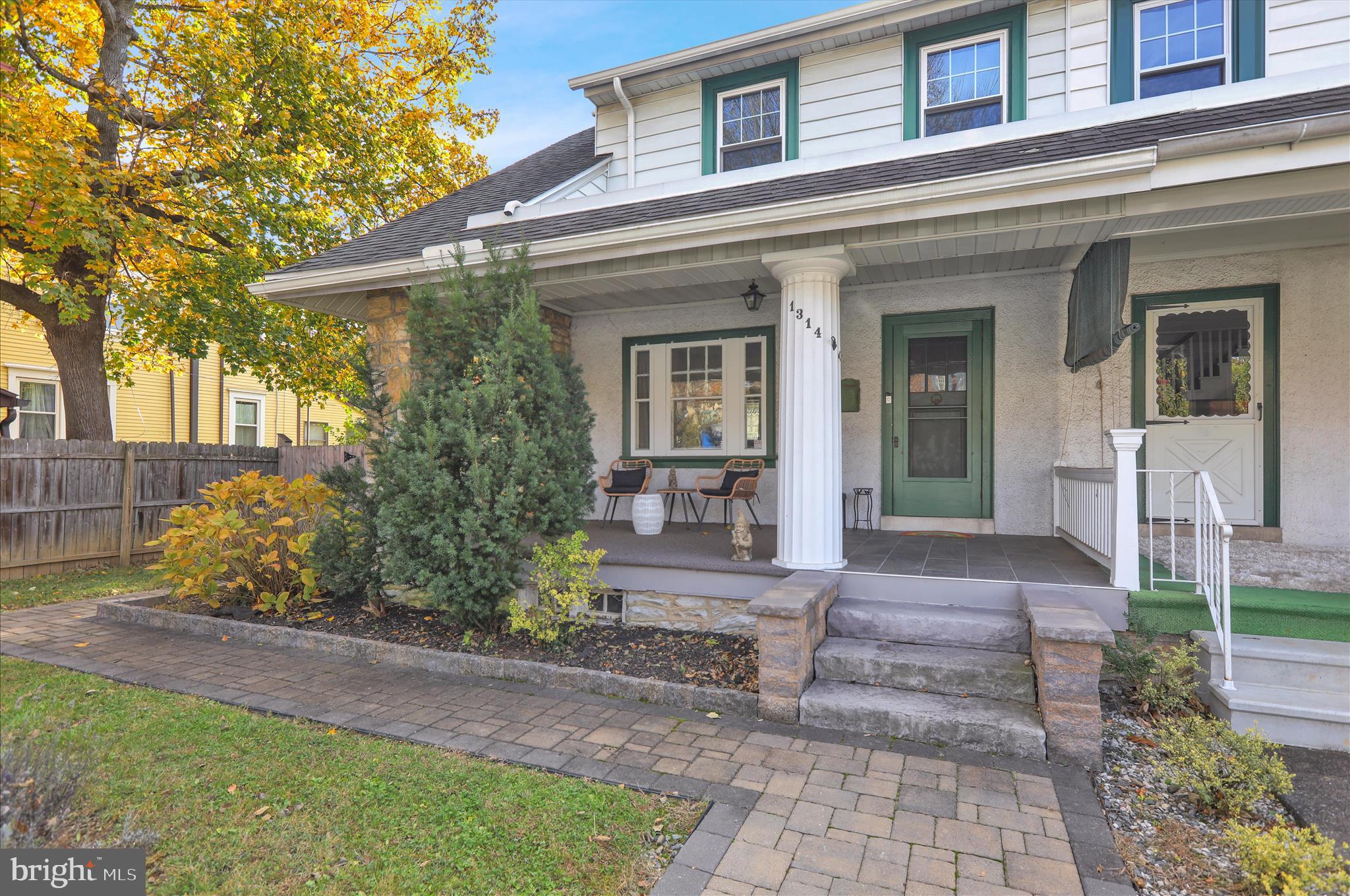 1314 Garfield Avenue Reading, PA 19610 - Photo 2 of 24 a front view of a house with garden