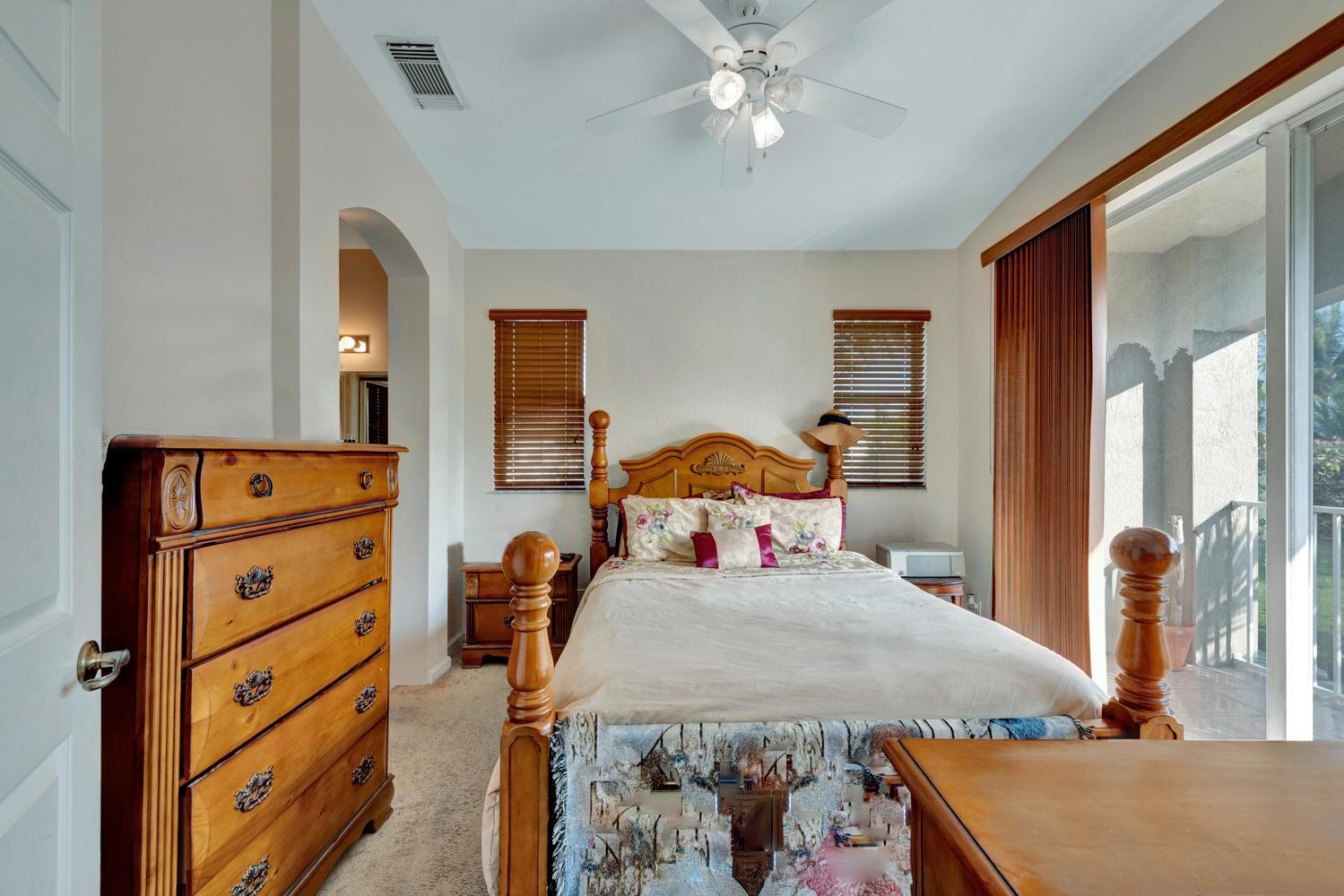 3001 Laurel Ridge Circle Riviera Beach, FL 33404 - Photo 6 of 21 MASTER BEDROOM