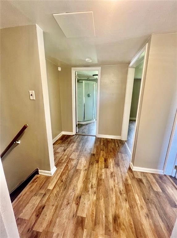 1718 Pierce Street Aliquippa, PA 15001 - Photo 3 of 7 a view of a room with wooden floor and staircase