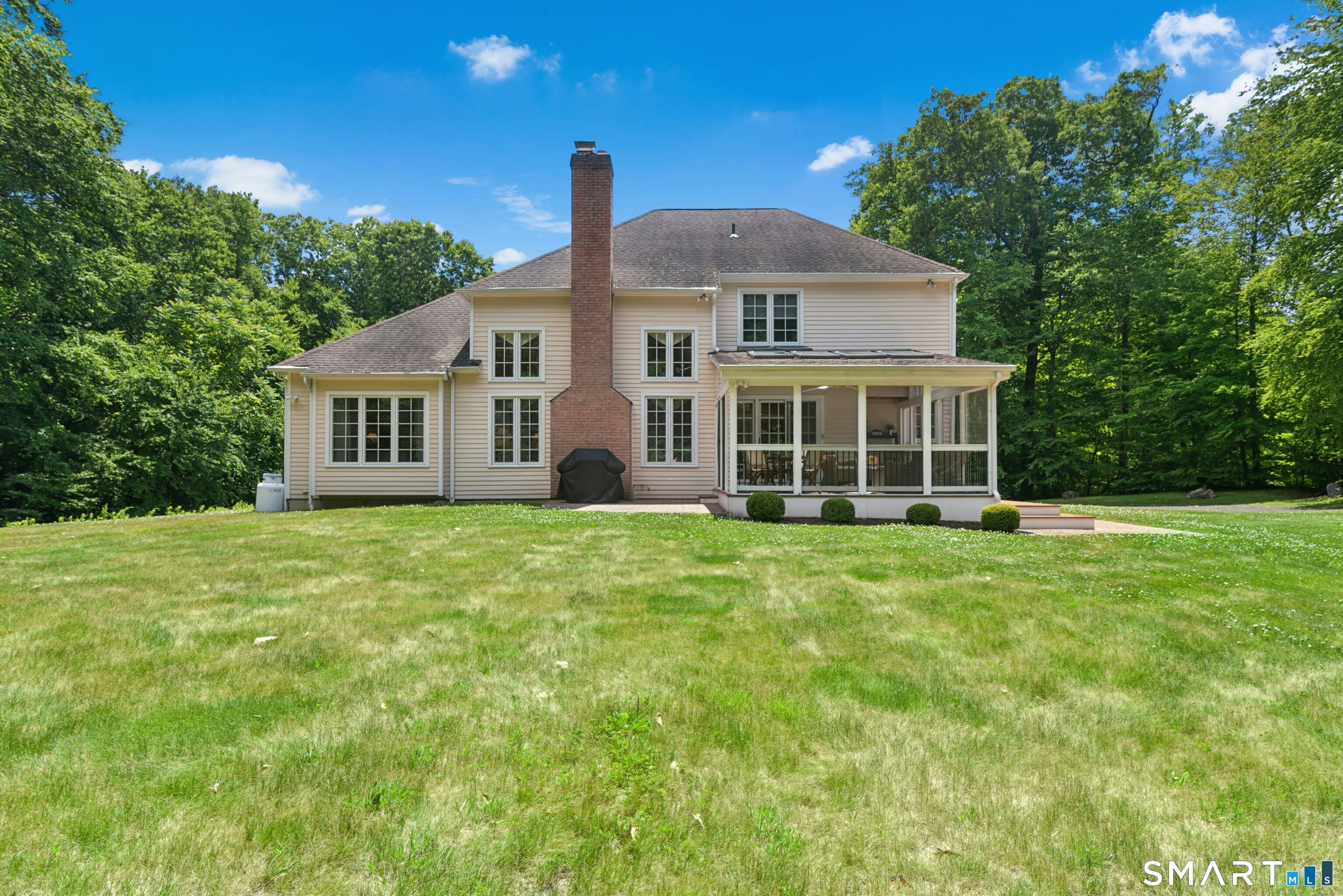 17 D Butterfield Road Newtown, CT 06470 - Photo 33 of 34 Rear View of Home with Expansive Level Backyard